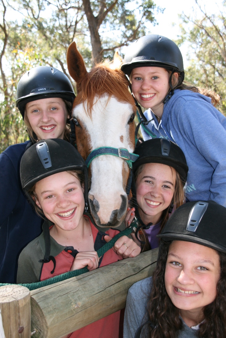 Young riders with their horse
